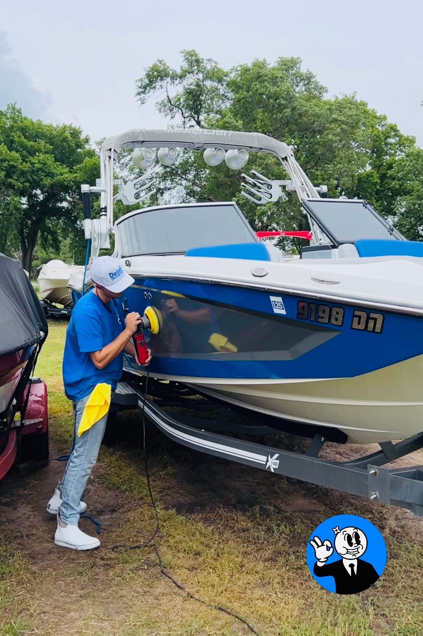Boat hull machine polishing in Toledo, OH to remove oxidation and restore gelcoat gloss