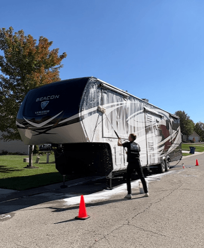 Mobile RV exterior wash in Toledo, OH with foam cannon at customer's location